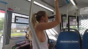 Holy crap, why's this girl flashing bare breasts on a public bus?!