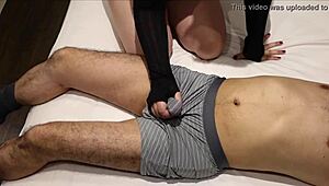 Massive cumshot through underwear during intense handjob in pants