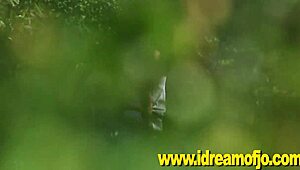 Jo masturbates in the wilderness.