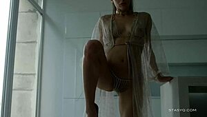 stunning girls perform striptease undressing slowly