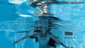 Hot chick lana swims nude underwater in the pool for your pleasure.