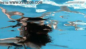 Hot chick lana swims nude underwater in the pool for your pleasure.