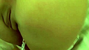 Horny brunette with shaved pussy and big tits gives blowjob