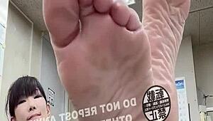 JAPANESE FETISH FEET WORSHIP AT THE OFFICE.