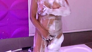 Beautiful Stepmother in Motel Jacuzzi Flashes Natural Tits Before Masturbating with Toys