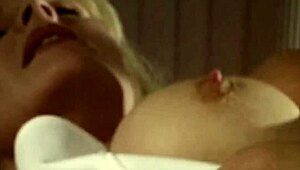 Busty housewife plays with pussy