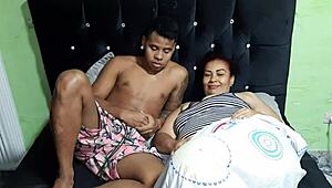 I suck my stepmom's tits in a hotel homemade video