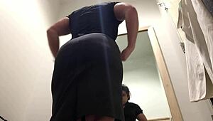 candid camera catches mature brunette flashing in mall changing room
