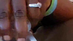 ebony self pleases her ass with toys