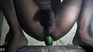 Horny gay says, 'fuck my pussy with that cucumber'