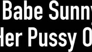 Hey, wanna see Sunny Lane finger her pussy outside?