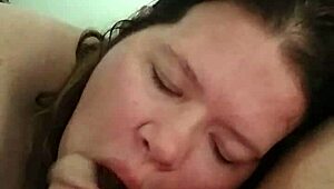 Slutslave1975 relishes sucking hard cock in gritty retro blue film.