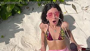 Skinny teen beauty pees on Maldives beach with golden shower twist