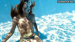 Ivi Rein's natural tits and tight pussy underwater adventure.