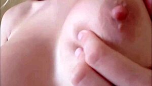 Busty blonde camgirl charmy fingers her shaved pussy in solo masturbation