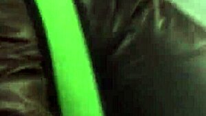 Spying on a chubby girl touching her brown nylon jacket on the street