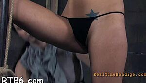 Bounded girl waits for her boyfriend in bondage