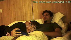 My stepbrother shoves his cock in my mouth while we’re in bed, no mercy!