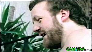 uncle dives into wild vintage hairy action in retro clip.