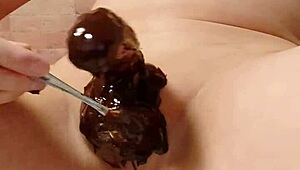 Japanese gay couple cooking chocolate banana in steamy scene