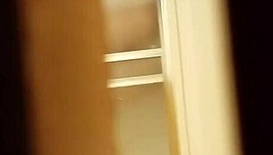 spying on a prostitute shaving her hairy pussy in secret.