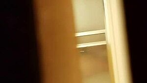 spying on a prostitute shaving her hairy pussy in secret.