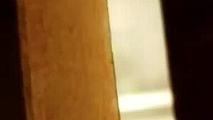 spying on a prostitute shaving her hairy pussy in secret.