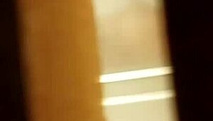 spying on a prostitute shaving her hairy pussy in secret.