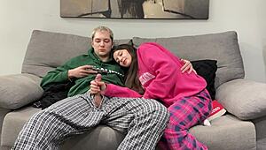 step brother jerks off to porn beside step sister, but she grabs his cock for a handjob instead