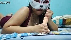 Does this wet-haired filipina chubby girl suck dildo sensually in maroon dress?