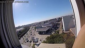 Sarada exposes big tits naked at hotel window near airport