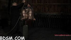 gagged serf pleasured with vibrator in rough seduction