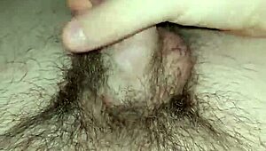 Young twink jerks off in homemade video.