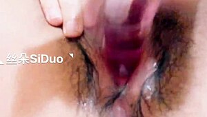 Wow, check this Chinese teen’s 36D tits on webcam! 😍