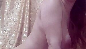 Amateur with big tits and shaved pussy performs wet private dance