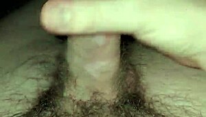 Young twink jerks off in homemade video.