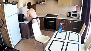 Is that big tits beauty cleaning the kitchen?