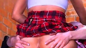 A student and teacher share an intimate moment after class.