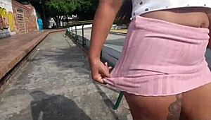 Colombian duo pleasures each other openly in public park