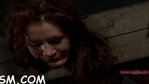 Look at this girl bound upside down, her pussy getting thrashed