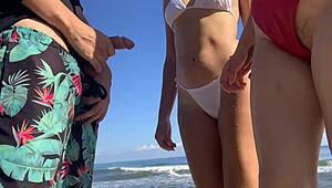 I’m jerking off at public beach, and two sexy chicks join to finish me!