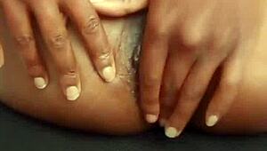 Horny milf fingering her wet pussy at work