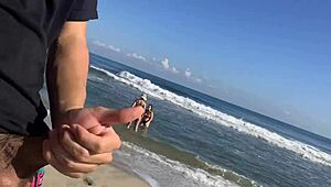 Jerking off on the beach while two sexy girls in the sea decide to join me