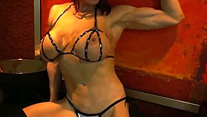 Muscular Redhead Bodybuilder In Bikini Dominates With Big Tits And Athletic Fitness