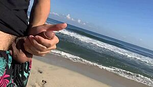 I’m jerking off at public beach, and two sexy chicks join to finish me!