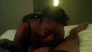 Ebony babe sucks black cock hard!