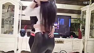 Stunning Chinese girl Michiel dances in tight leather pants