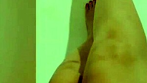 Cute girl shows her sexy legs and then masturbates her wet hole