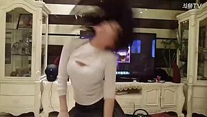 Stunning Chinese girl Michiel dances in tight leather pants