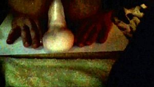 The sissy whore eagerly rides a thick dildo in stockings